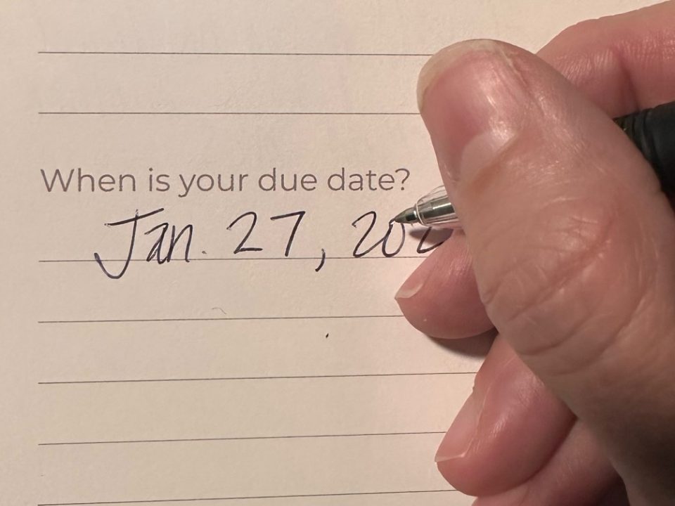image of someone writing the date "jan. 27, 202...." underneath a question that asks When is your due date?